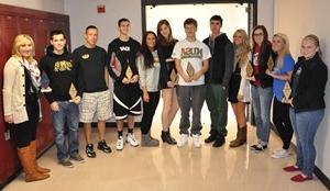 students standing by lockers